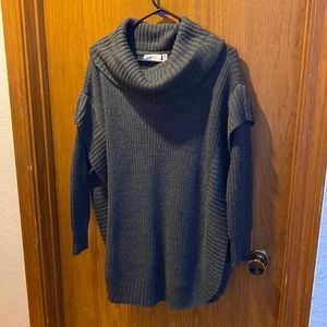 Comfy and cozy knit poncho style sweater.
